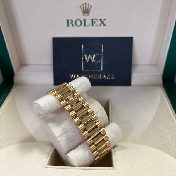 ROLEX DAY-DATE YELLOW GOLD BLACK MOTIF DIAL 228238 2021