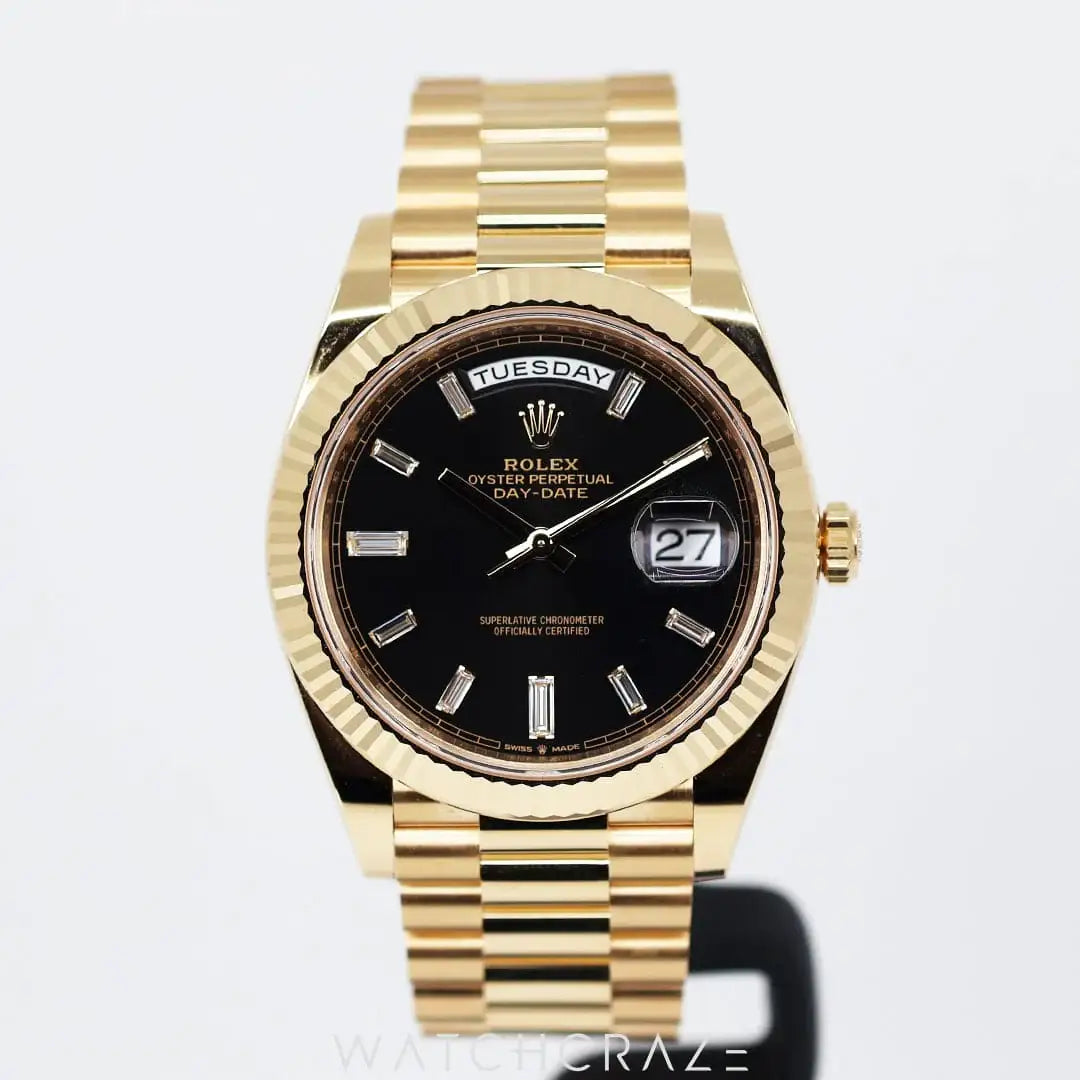 2023 ROLEX DAY-DATE YELLOW GOLD BLACK DIAL W/ BAGUETTE MARKERS 40MM 228238a