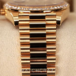 2025 ROLEX DAY DATE YELLOW GOLD OYNX DIAL DIAMOND BEZEL 40MM 228238