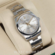 2025 ROLEX OYSTER PERPETUAL CHAMPAGNE DIAL 34MM 124200