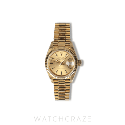ROLEX LADIES DATEJUST YELLOW GOLD CHAMPAGNE DIAL 26MM 69178