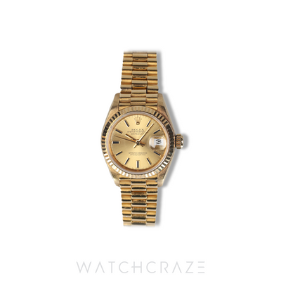 ROLEX LADIES DATEJUST YELLOW GOLD CHAMPAGNE DIAL 26MM 69178