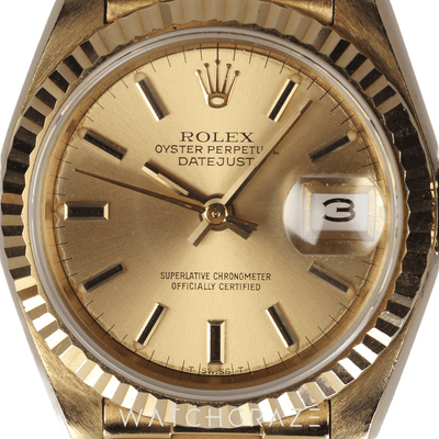 ROLEX LADIES DATEJUST YELLOW GOLD CHAMPAGNE DIAL 26MM 69178