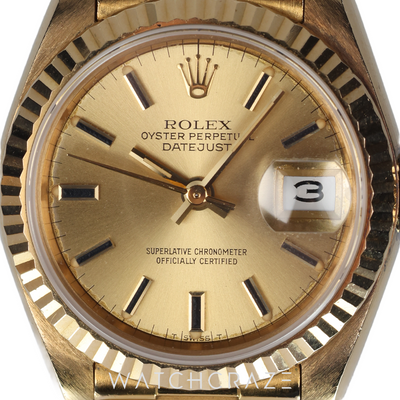 ROLEX LADIES DATEJUST YELLOW GOLD CHAMPAGNE DIAL 26MM 69178