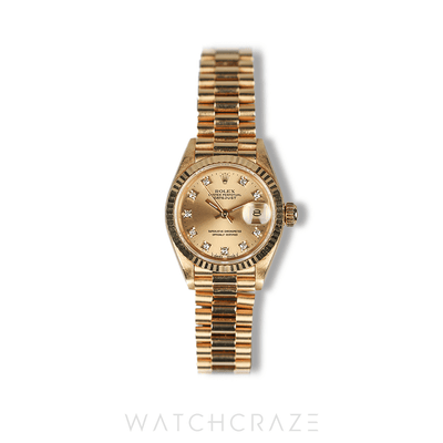 ROLEX LADIES DATEJUST YELLOW GOLD CHAMPAGNE DIAL DIAMOND MARKERS 26MM 69178G