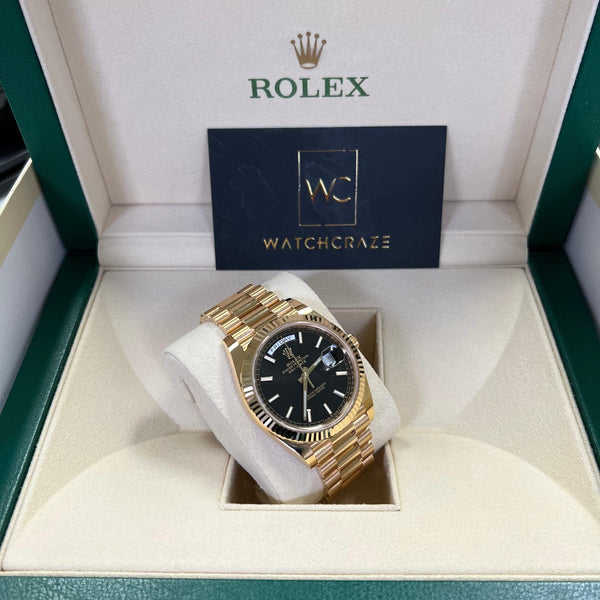ROLEX DAY-DATE YELLOW GOLD BLACK MOTIF DIAL 228238 2021 - WatchCraze.com.au