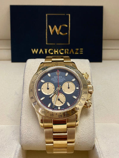ROLEX DAYTONA YELLOW GOLD BLACK DIAL 2006 116528 - WatchCraze.com.au