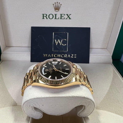 ROLEX DAY-DATE YELLOW GOLD BLACK MOTIF DIAL 228238 2021 - WatchCraze.com.au